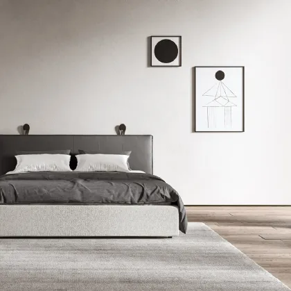 Letto con testiera in pelle e giroletto in tessuto Delfi di Presotto