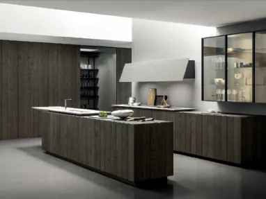 Cucina Design con isola Float finitura Rovere Carbone con top in Pietra Piasentina Fiammata di Modulnova